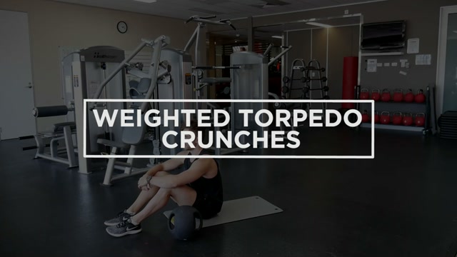 Weighted Torpedo Crunches demonstration
